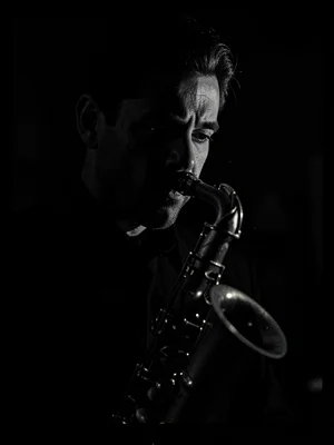 Saxophone bell in darkness