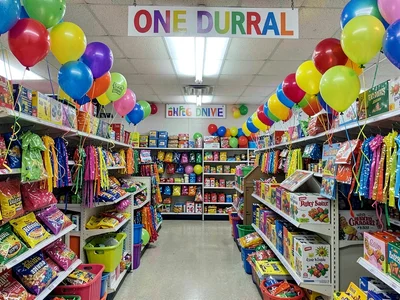 Party supplies aisle, balloons and streamers in every color, birthday abundance 