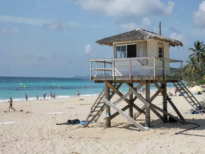 Beach scene with lifeguard tower