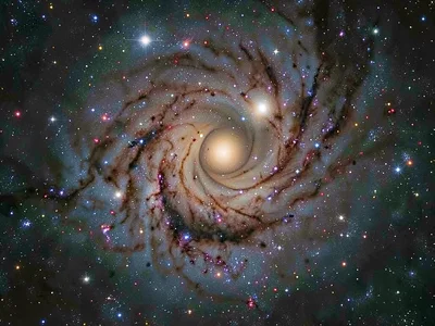 Galaxy behind nebula creating depth
