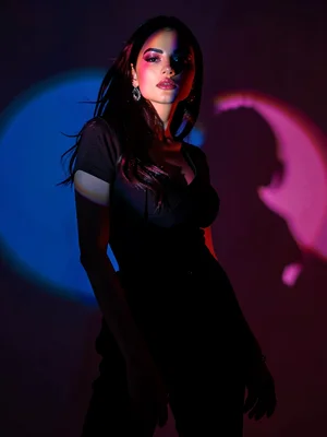 Fashion model in colored shadows