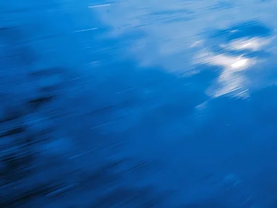Sea surface blurred to solid blue