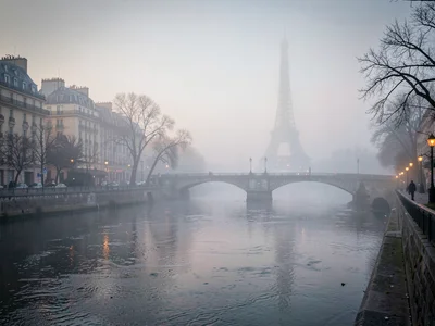 Bridge span visible only as suggestion in mist