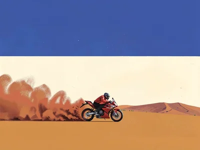 Speeding motorbike speck cuts a copper-red dust line across an ochre plateau und