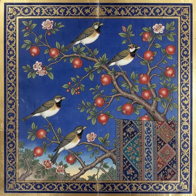 Birds among flowering pomegranate branches against a lapis blue sky