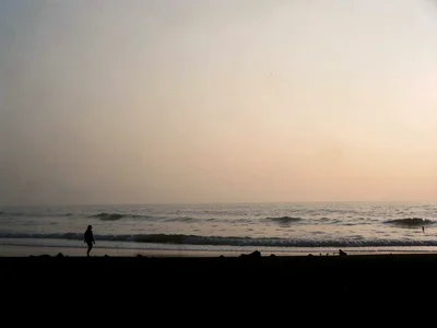 Beach silhouette with haze