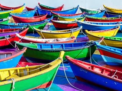Painted boats creating color pattern
