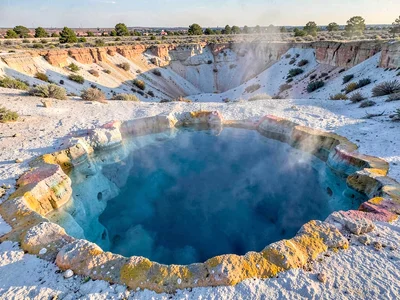 Clear hot spring showing blue depth