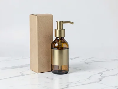Glass pump bottle with brass detail elevation