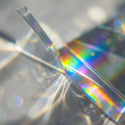 Extreme macro of a prism's exit face, visible dispersion right at the glass-air 