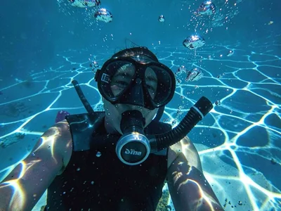 Snorkeler in caustic light