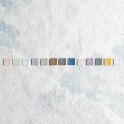 Wide layout of a horizontal palette ramp of small tonal swatches across a chalk 