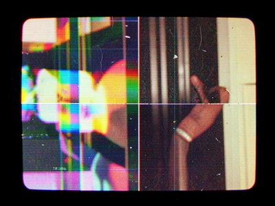 Paused tape at recording boundary, half old recording half new, jarring scene tr