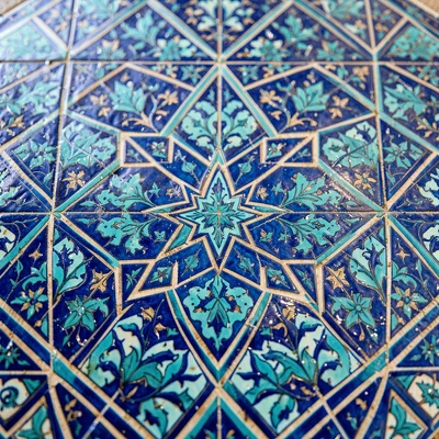 Samarkand blue majolica against Central Asian terracotta, detail of geometric st