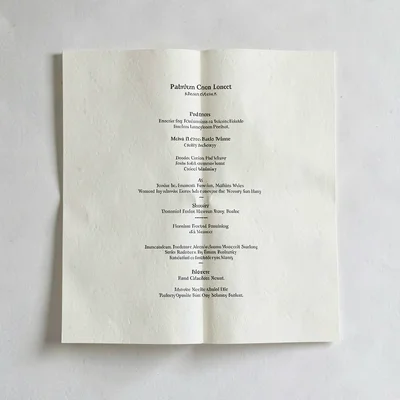 Paper-fold editorial layout of an open chamber concert program on cream paper, s