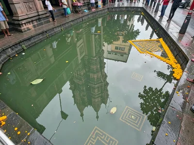 Temple tank gopuram reflection
