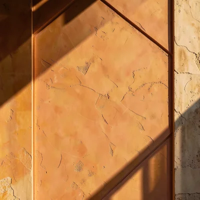Venetian plaster wall in warm terracotta, subtle trowel marks, Mediterranean