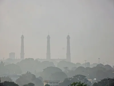 Distant towers fading into smog