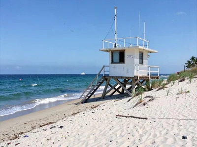 Beach scene with lifeguard tower