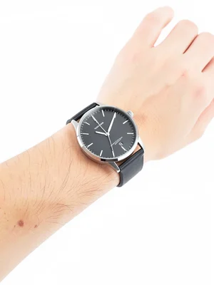 Watch on wrist, white backdrop