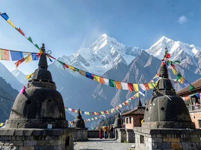 Prayer flags and Himalayan peaks