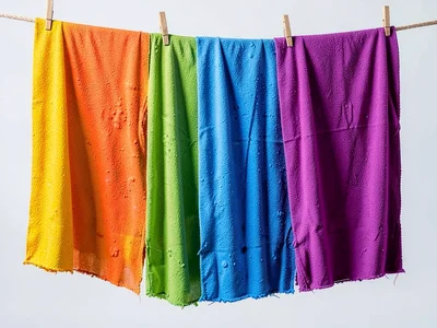Textile dyes hanging to dry