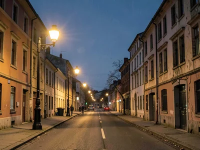 Street lamps just coming on at dusk